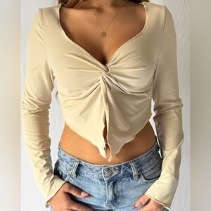 Long-Sleeve Twist Front Crop Top in Cream